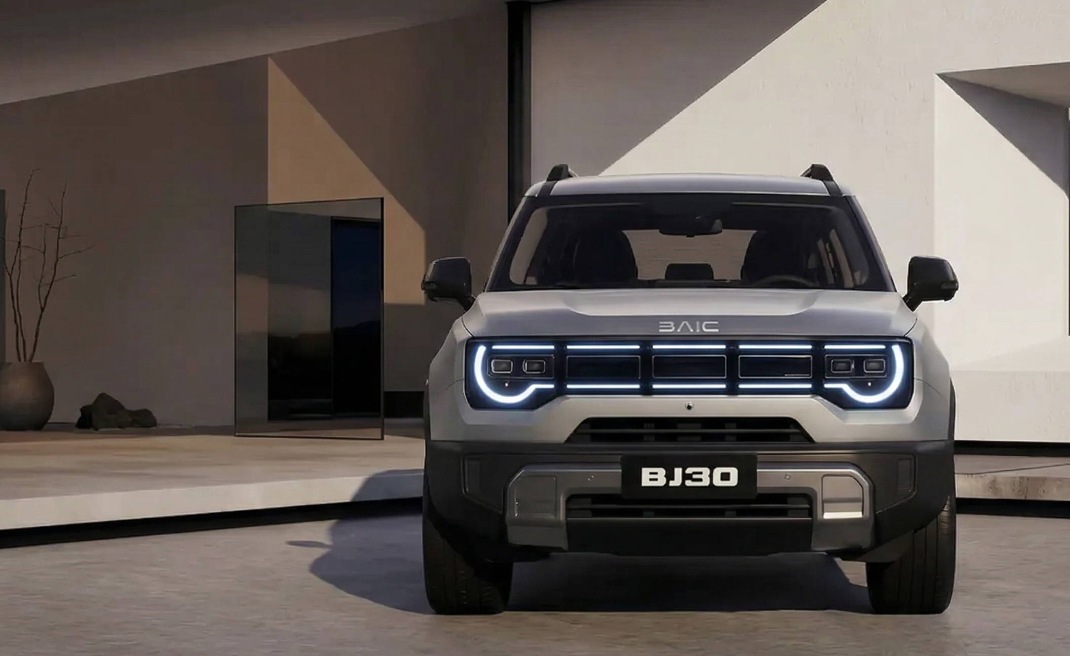 Auto BAIC visto de frente — ópticas características de la marca